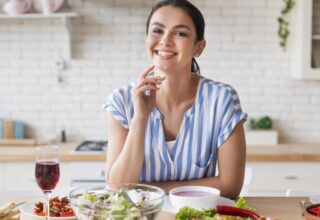 medium-shot-smiley-woman-posing-indoors